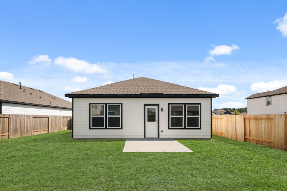 A house with a fence around it.