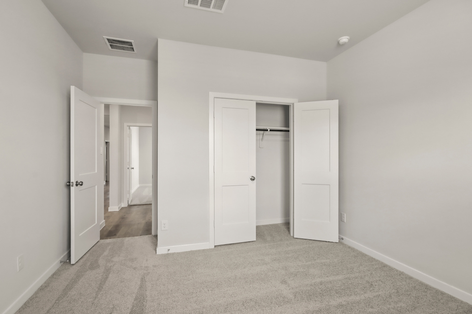 A room with white doors.