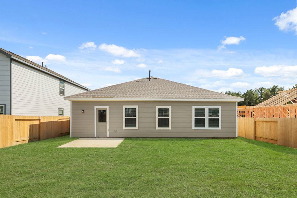 A house with a fence around it.