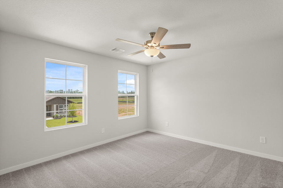 A ceiling fan in a room.