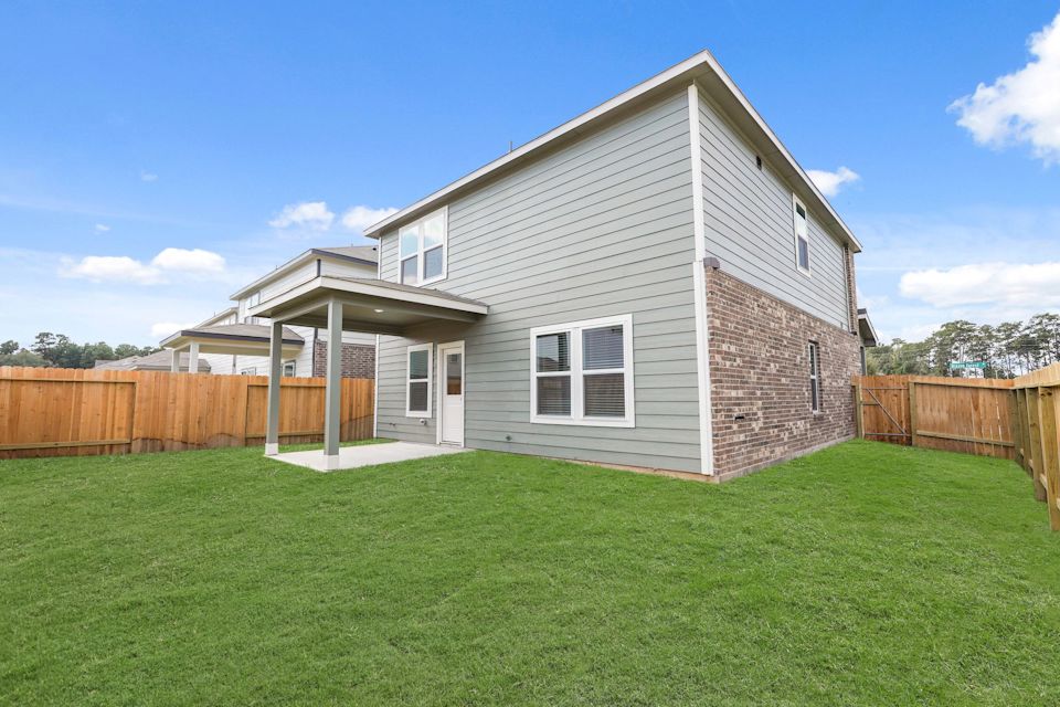 A house with a fence around it.
