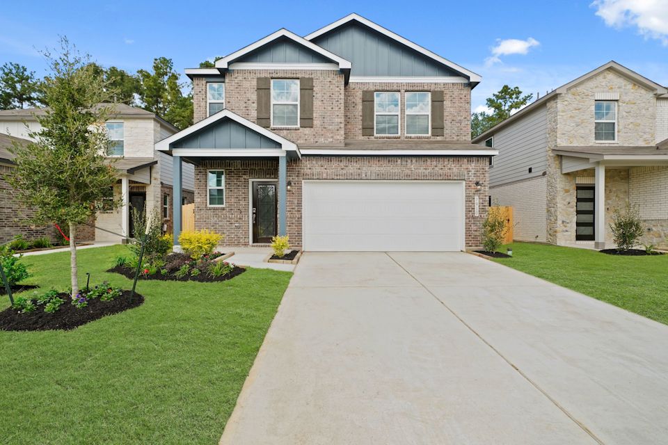 A driveway leading to a house.