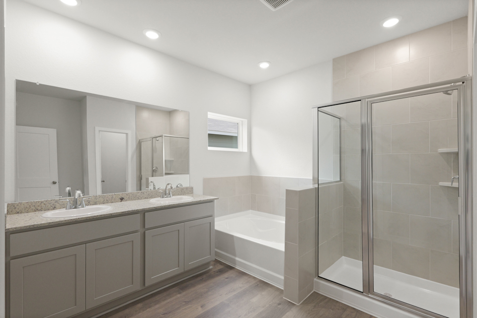 A bathroom with a glass shower.