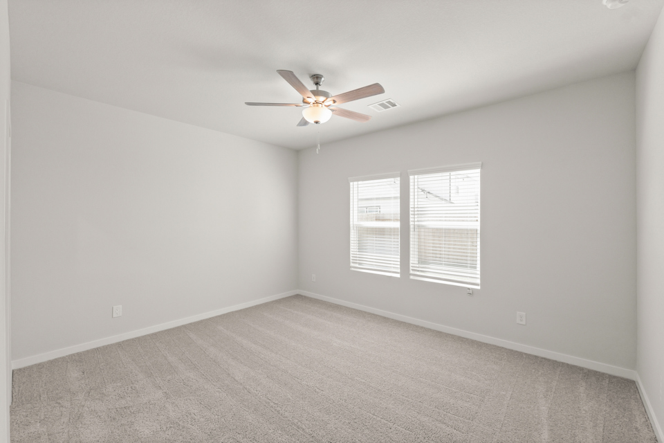 A ceiling fan in a room.