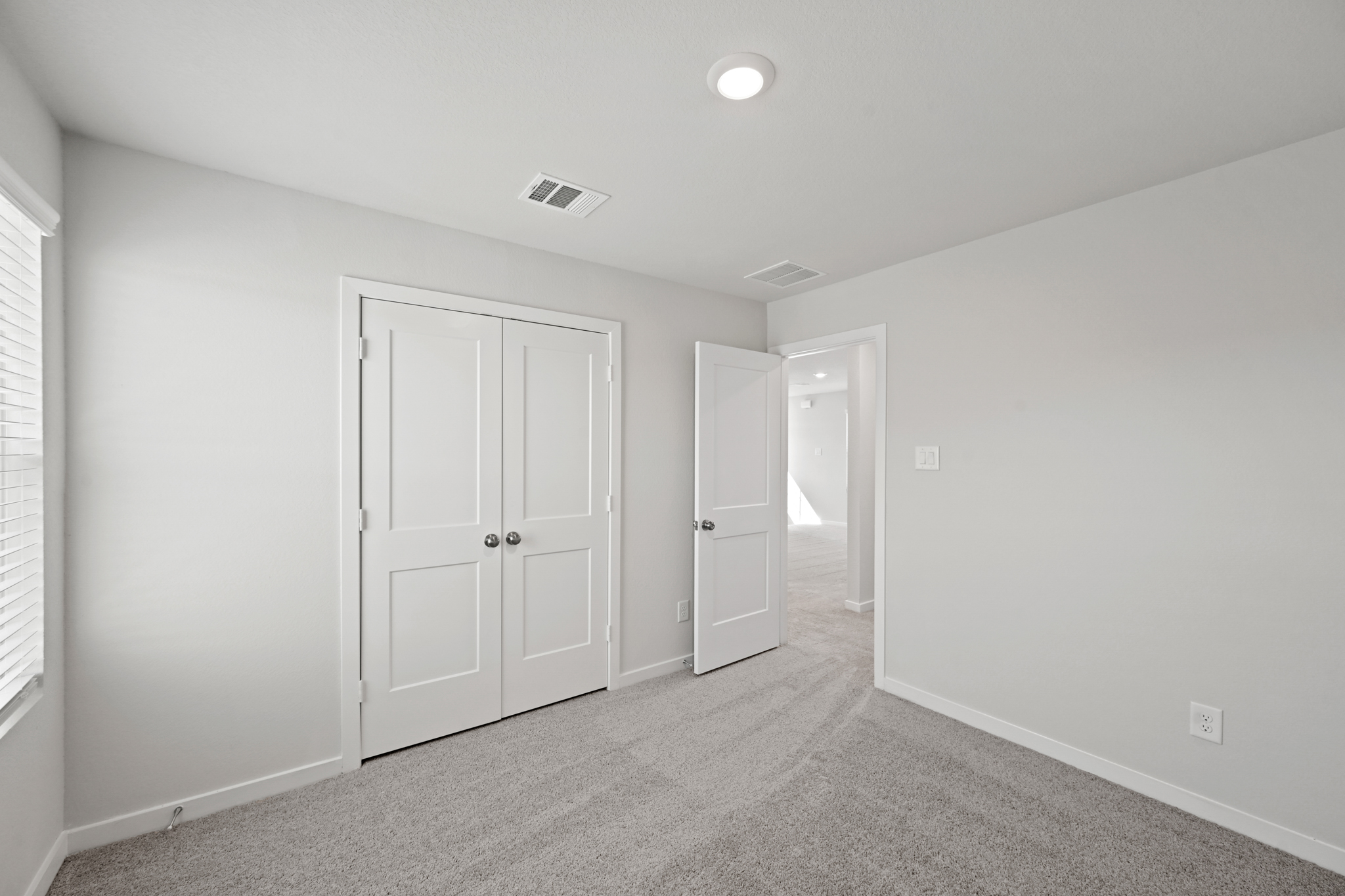 A room with white doors.