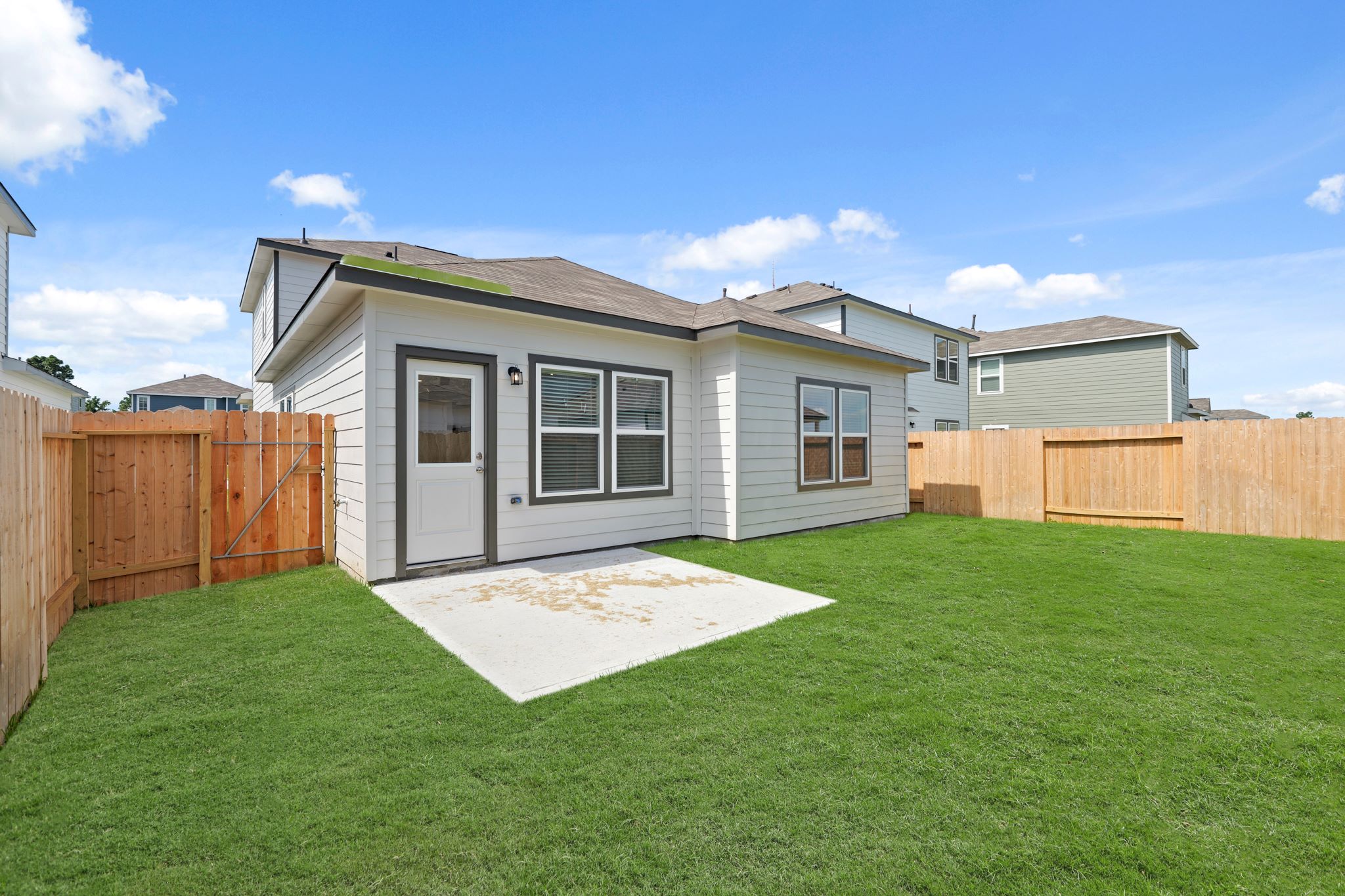 A house with a fence around it.