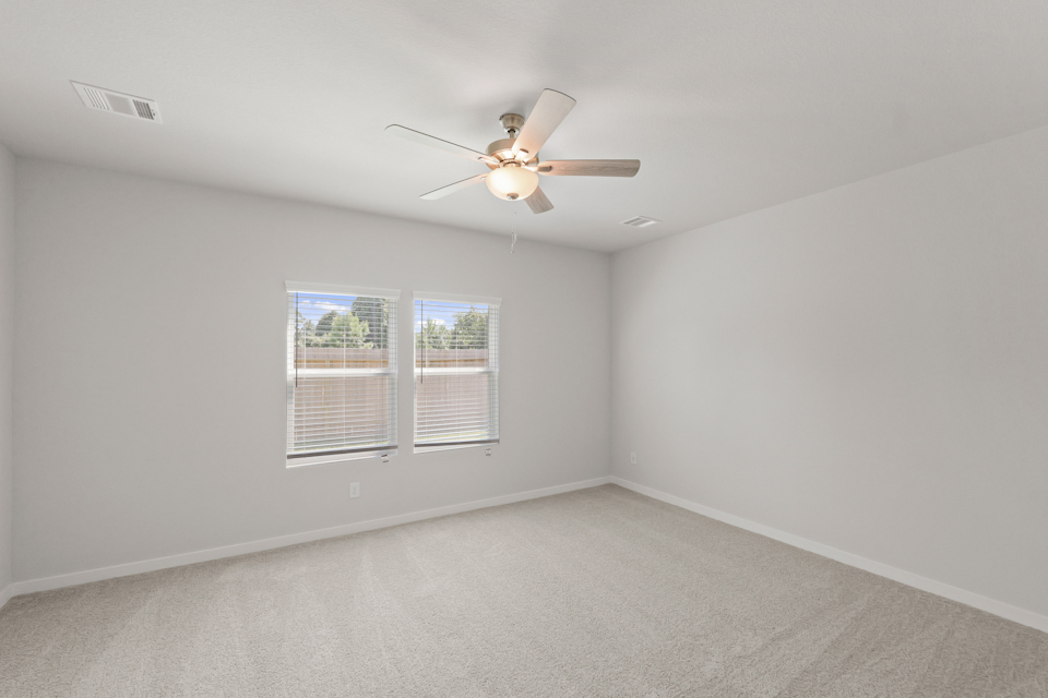 A ceiling fan in a room.