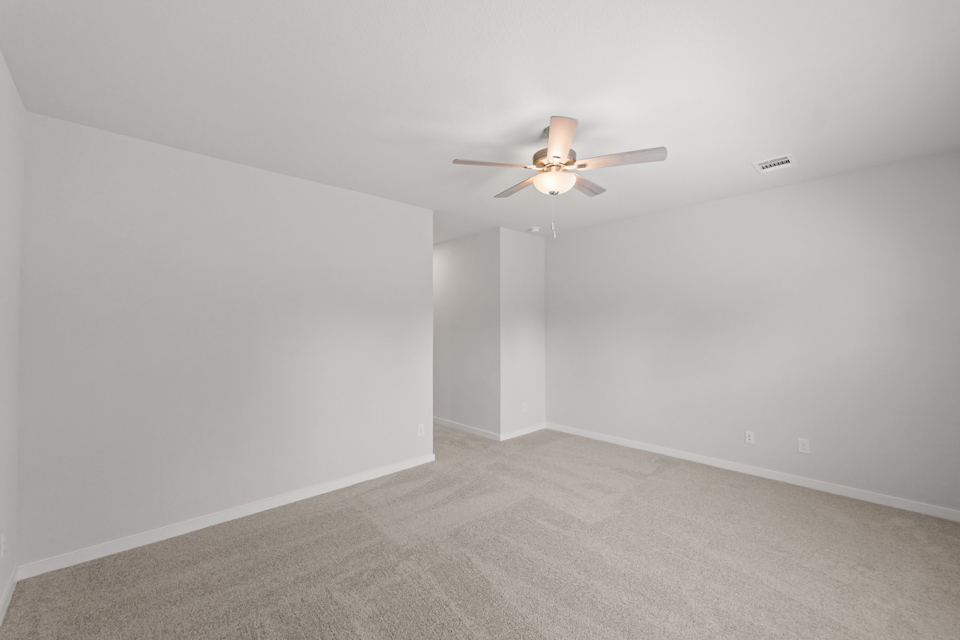 A ceiling fan in a room.