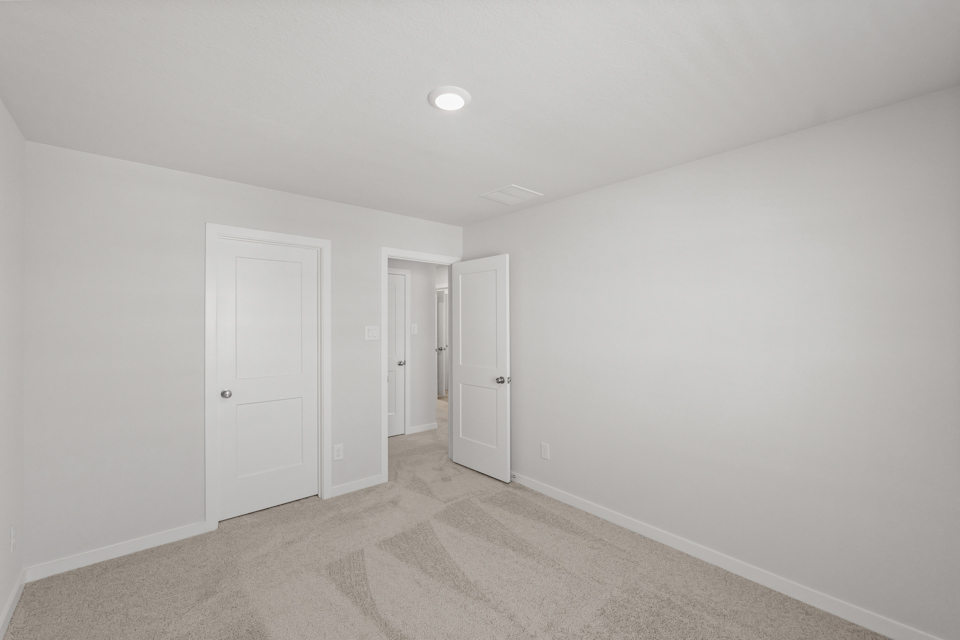 A room with white doors.