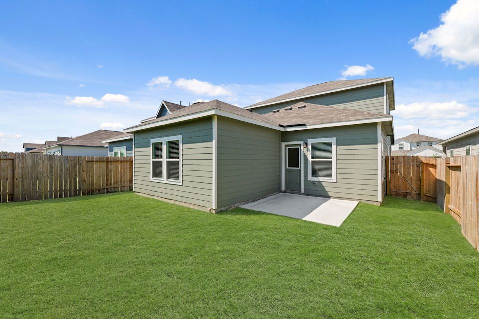A house with a fence around it.
