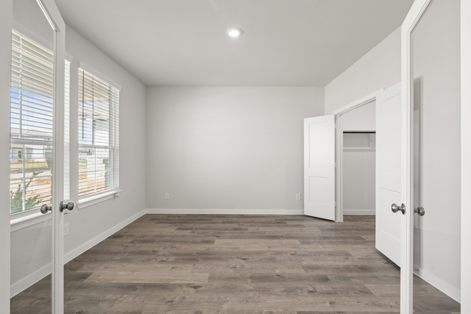 A room with white doors.