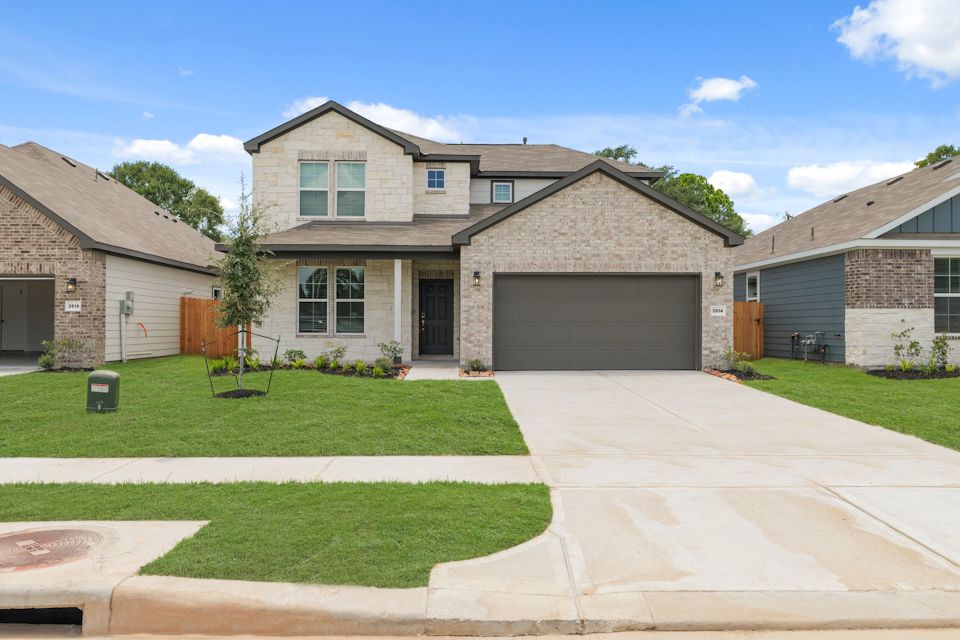 A house with a driveway.