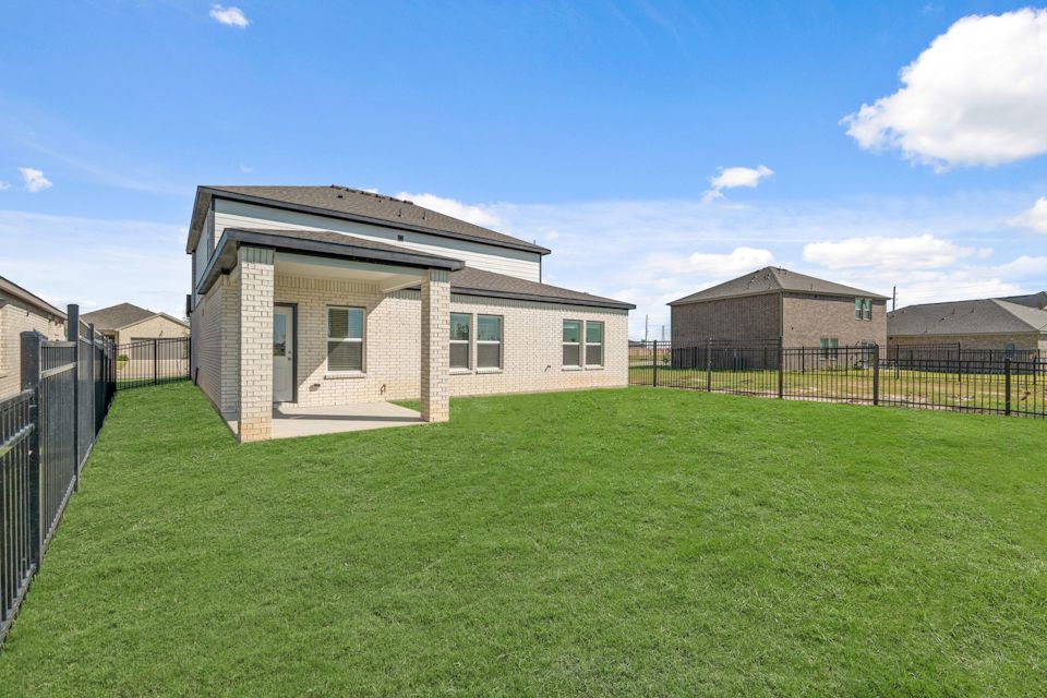 A house with a fence around it.