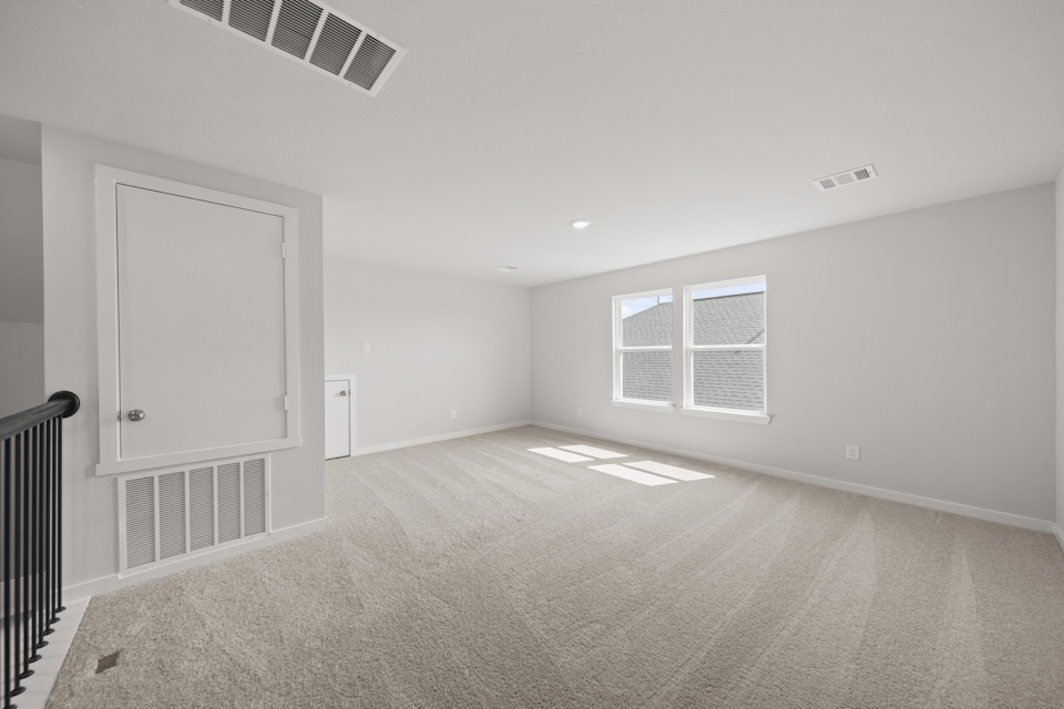 A room with a door and a window.