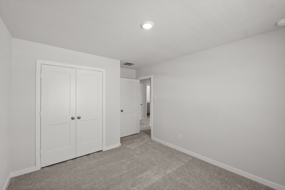A room with white doors.