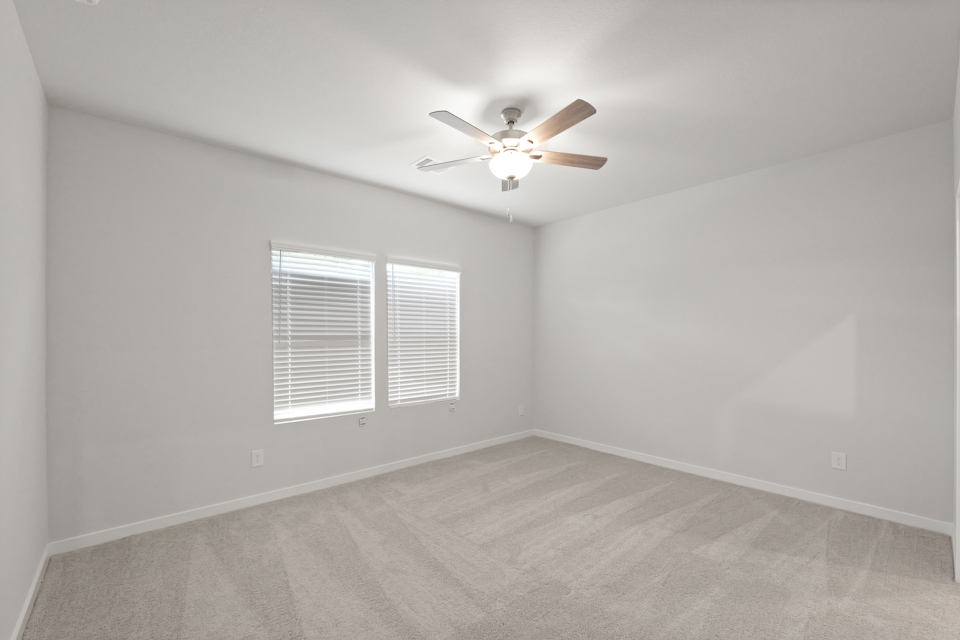 A ceiling fan in a room.