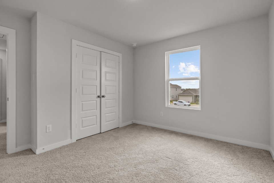 A room with white doors.
