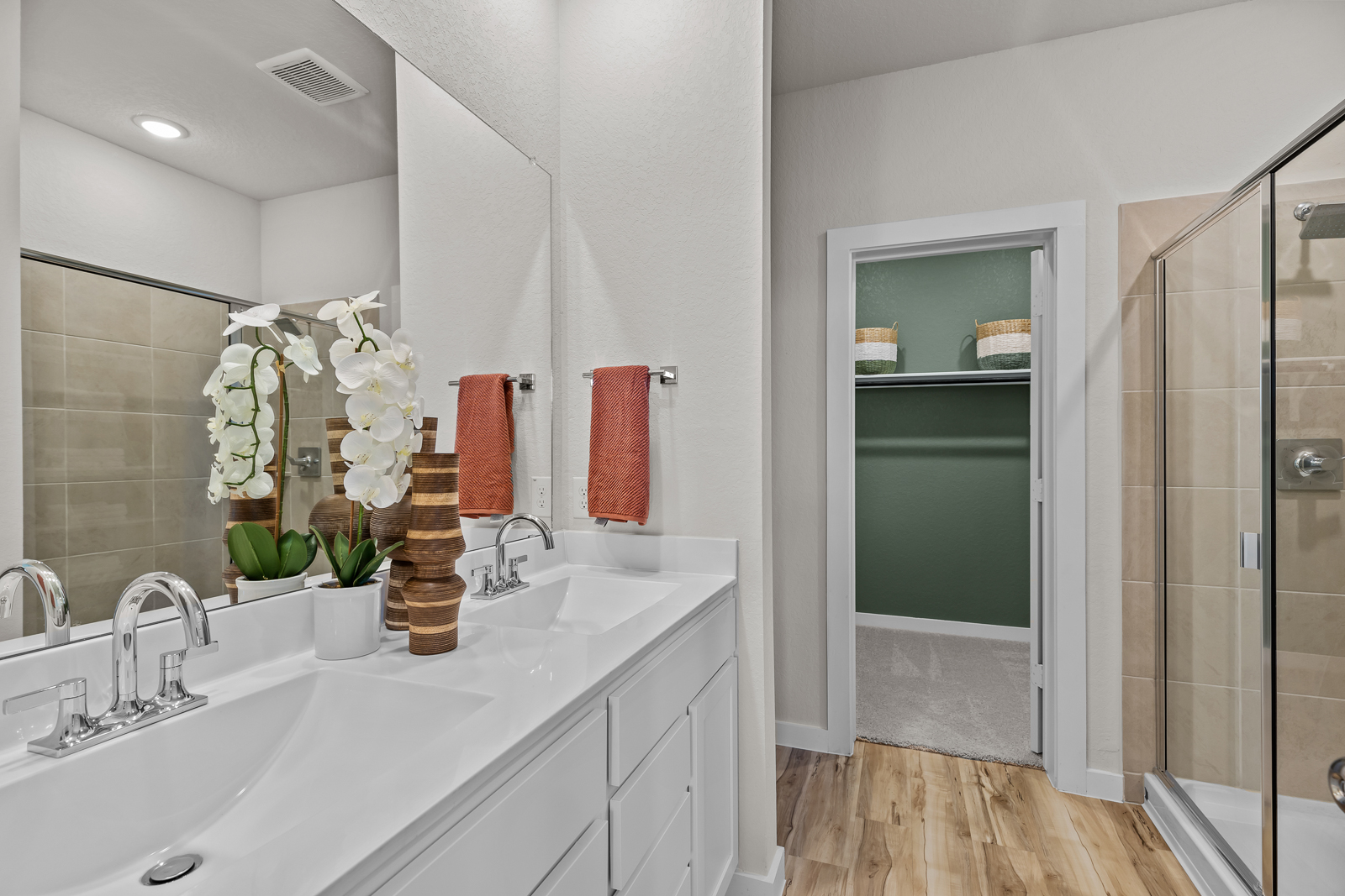 A bathroom with a glass shower.