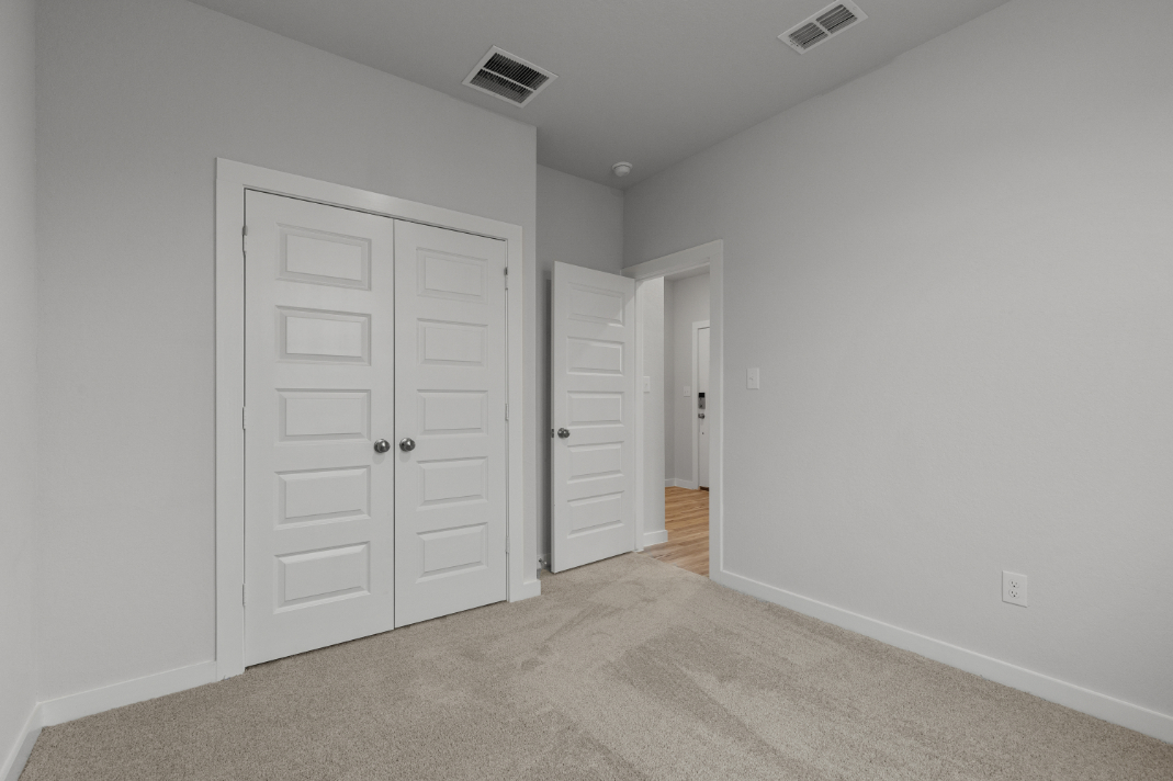 A room with white doors.