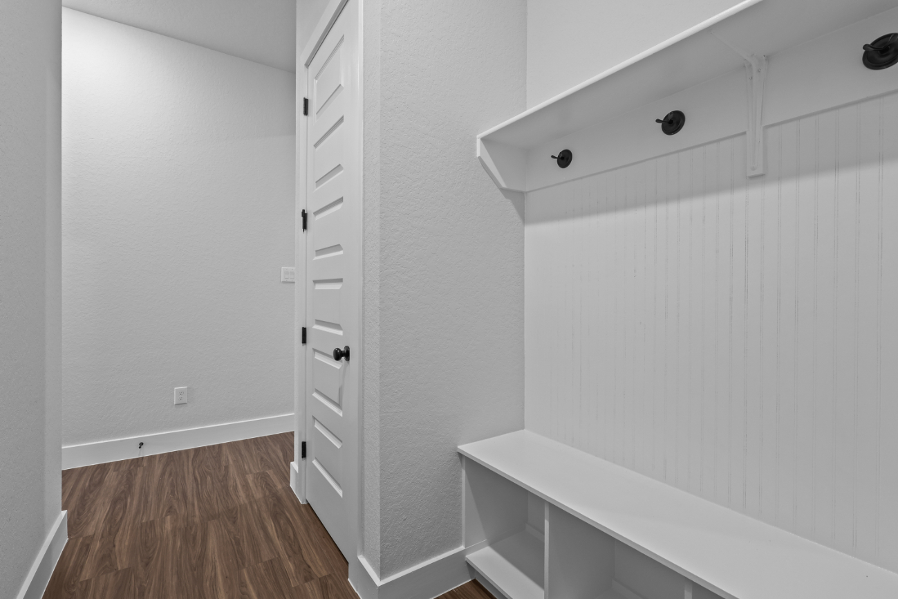 A white room with a white wall.