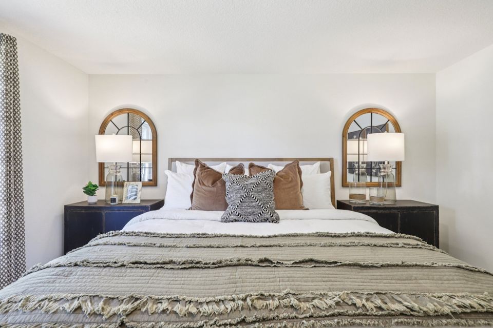 A bed with pillows.