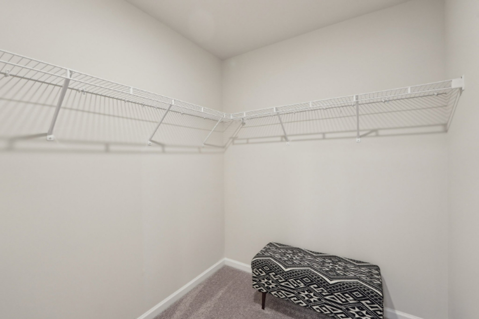 A bed in a room.