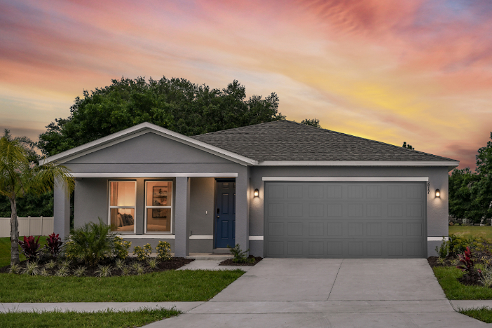 A house with a garage and a driveway.