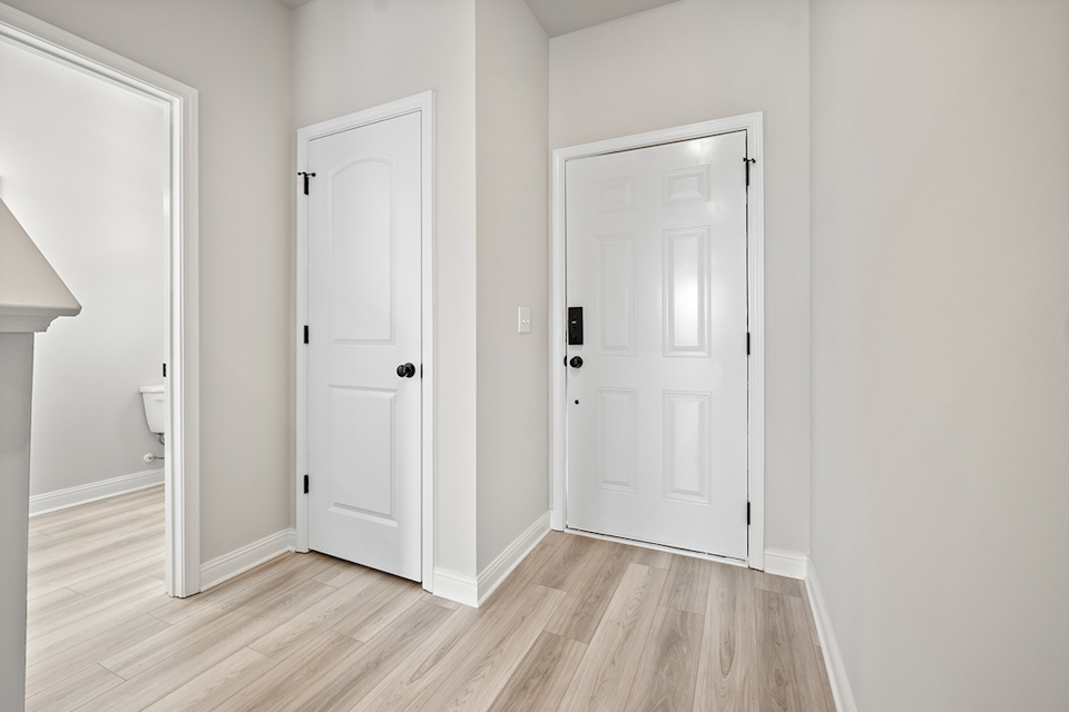 A room with white doors.