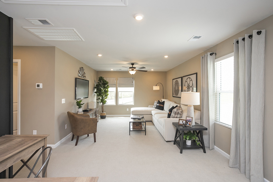 A living room with a large window.