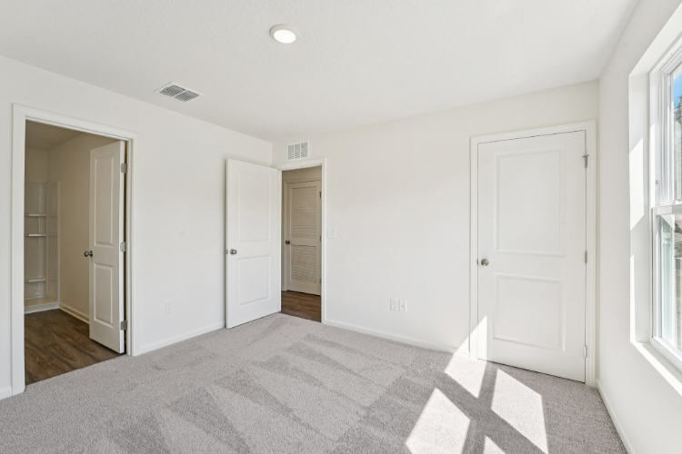A room with white doors.