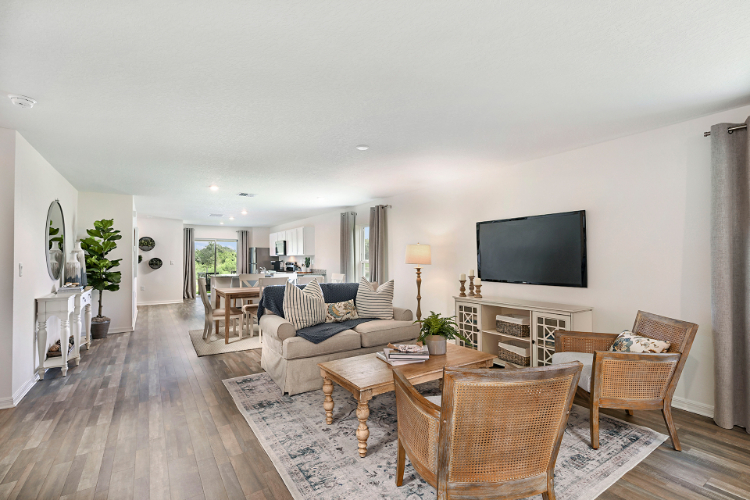 A living room with a tv and couches.