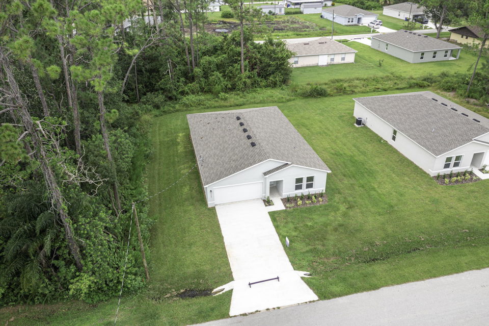 A house in a grassy area.