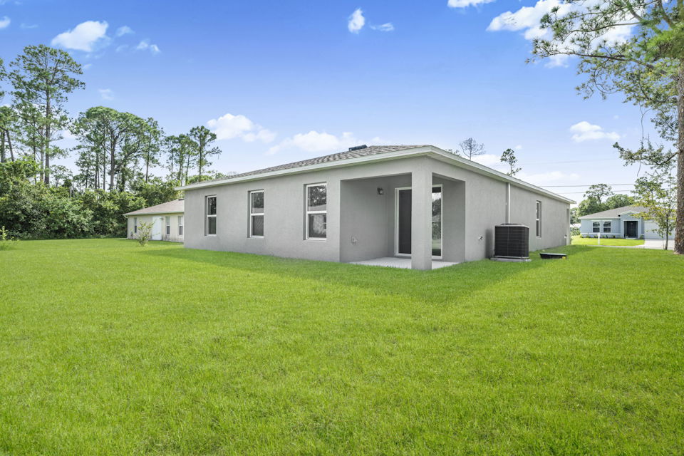 A house with a lawn.