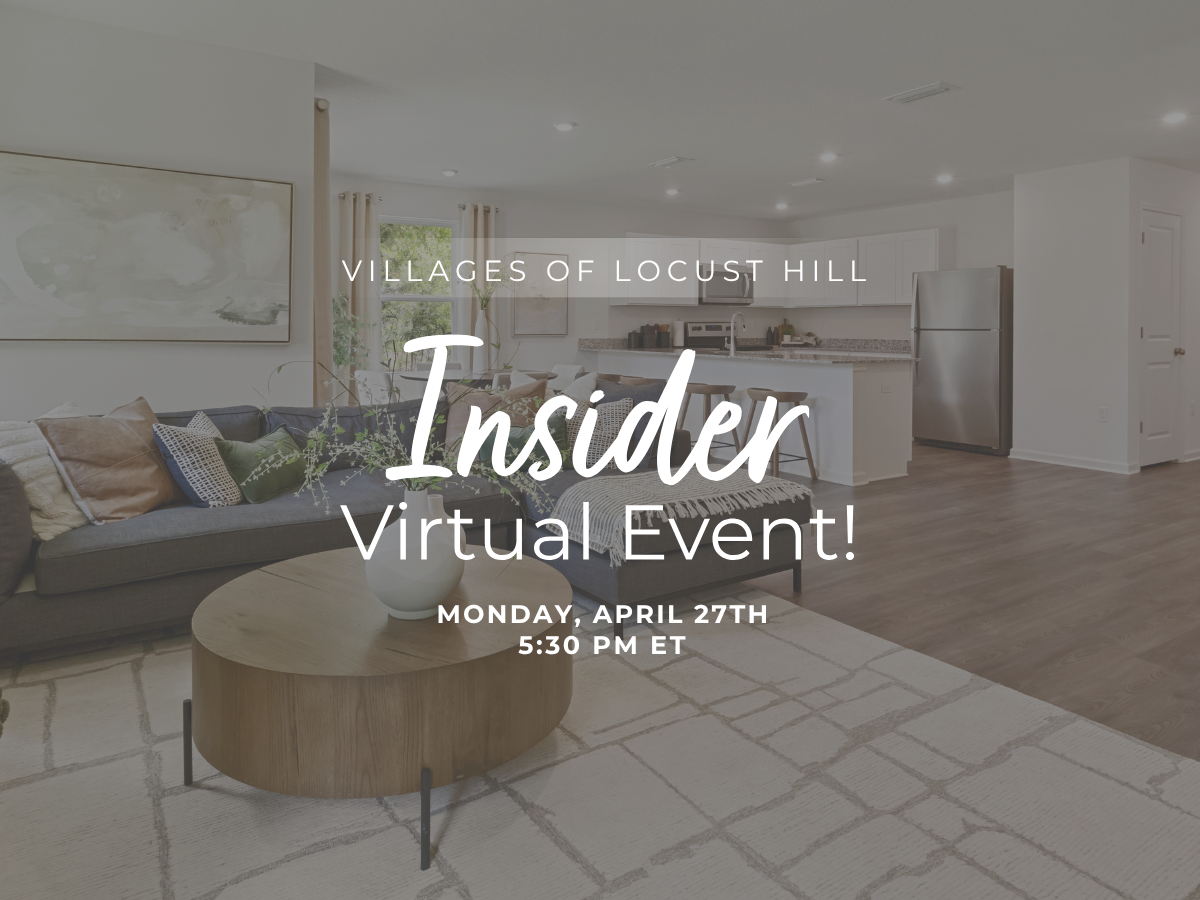 A living room with a large table and couches.