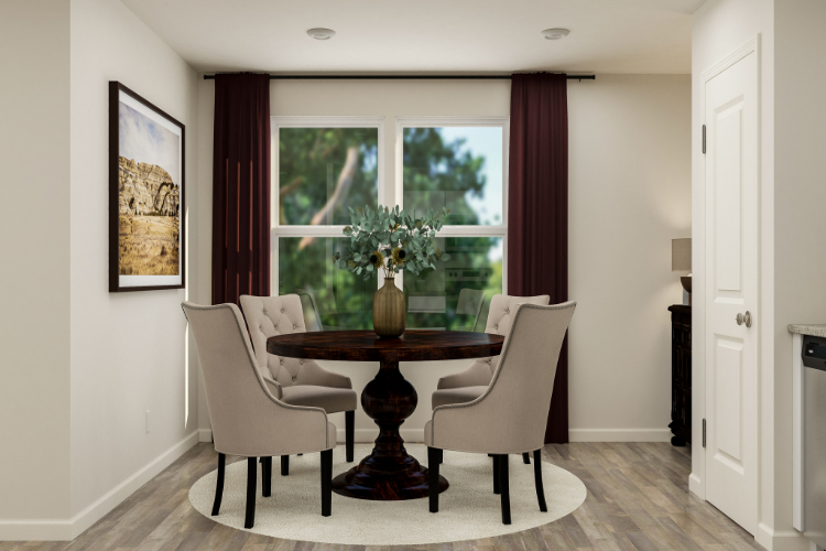 A dining room table with chairs.